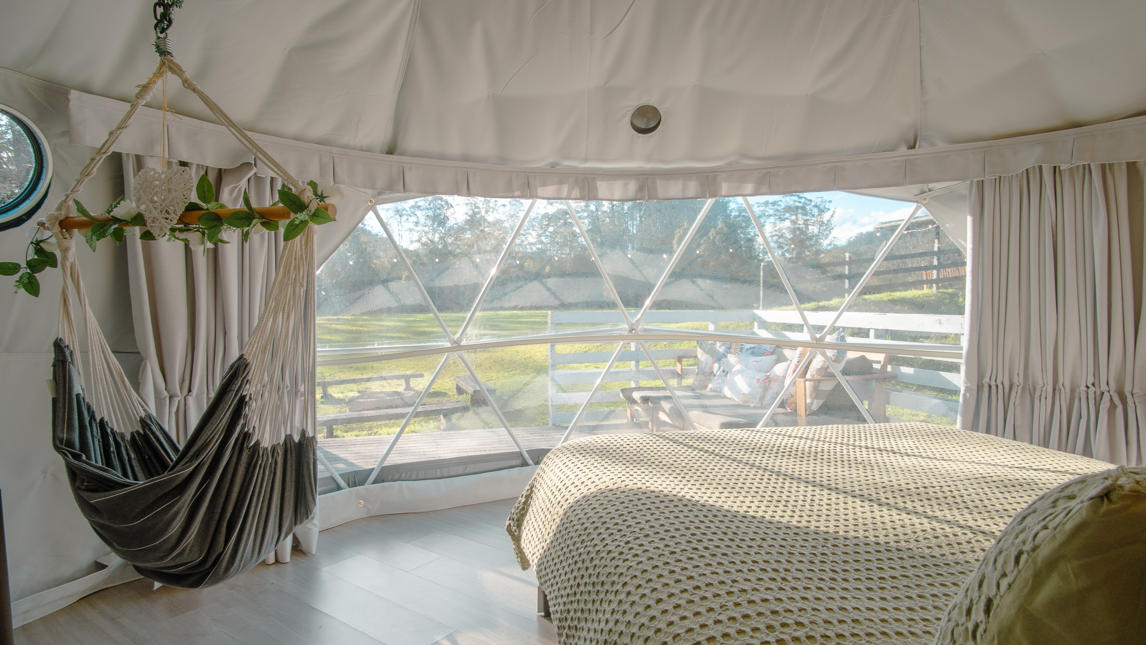 Morning view from the queen bed through the panoramic window