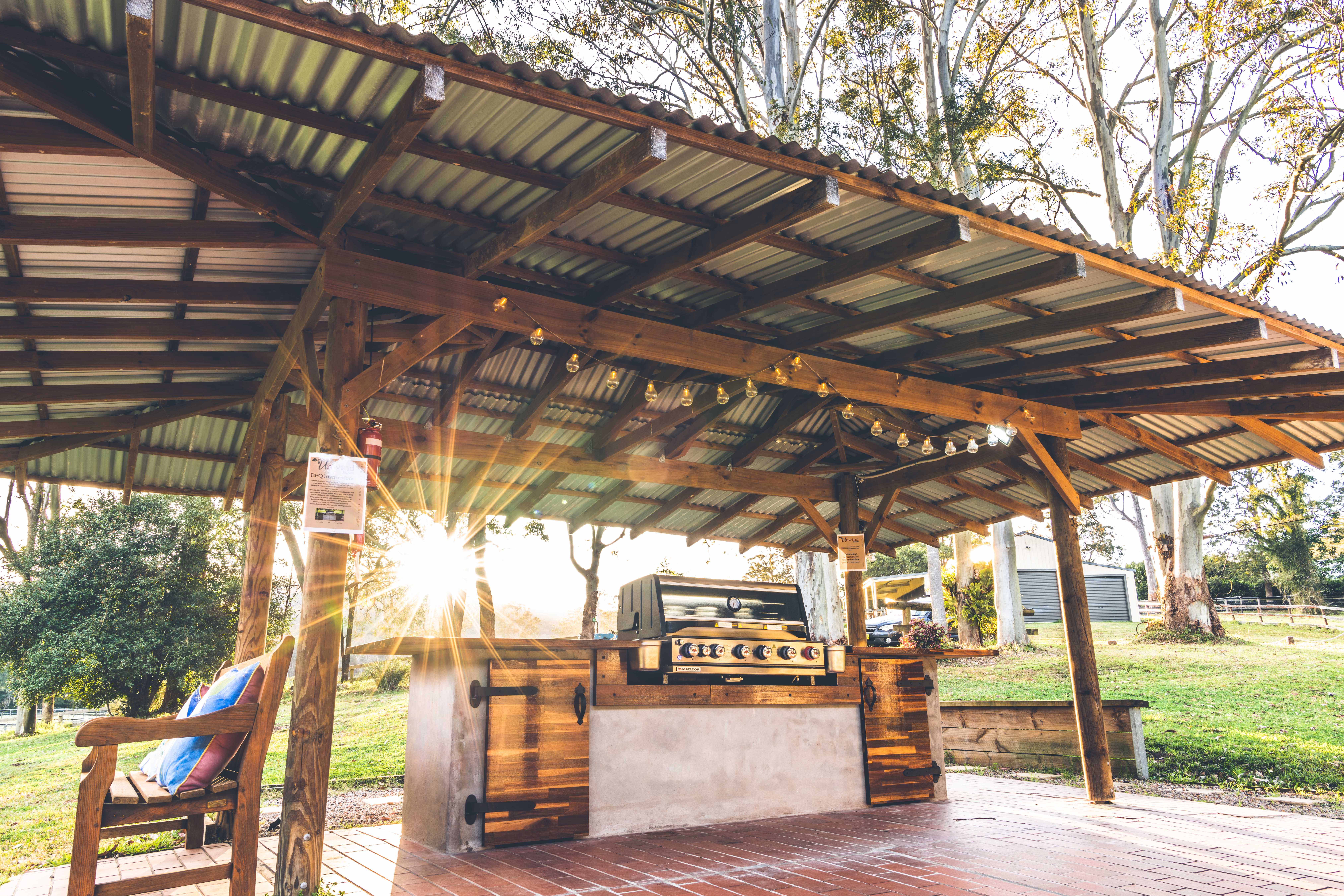 6-burner Matador BBQ (shared) — undercover with prep area