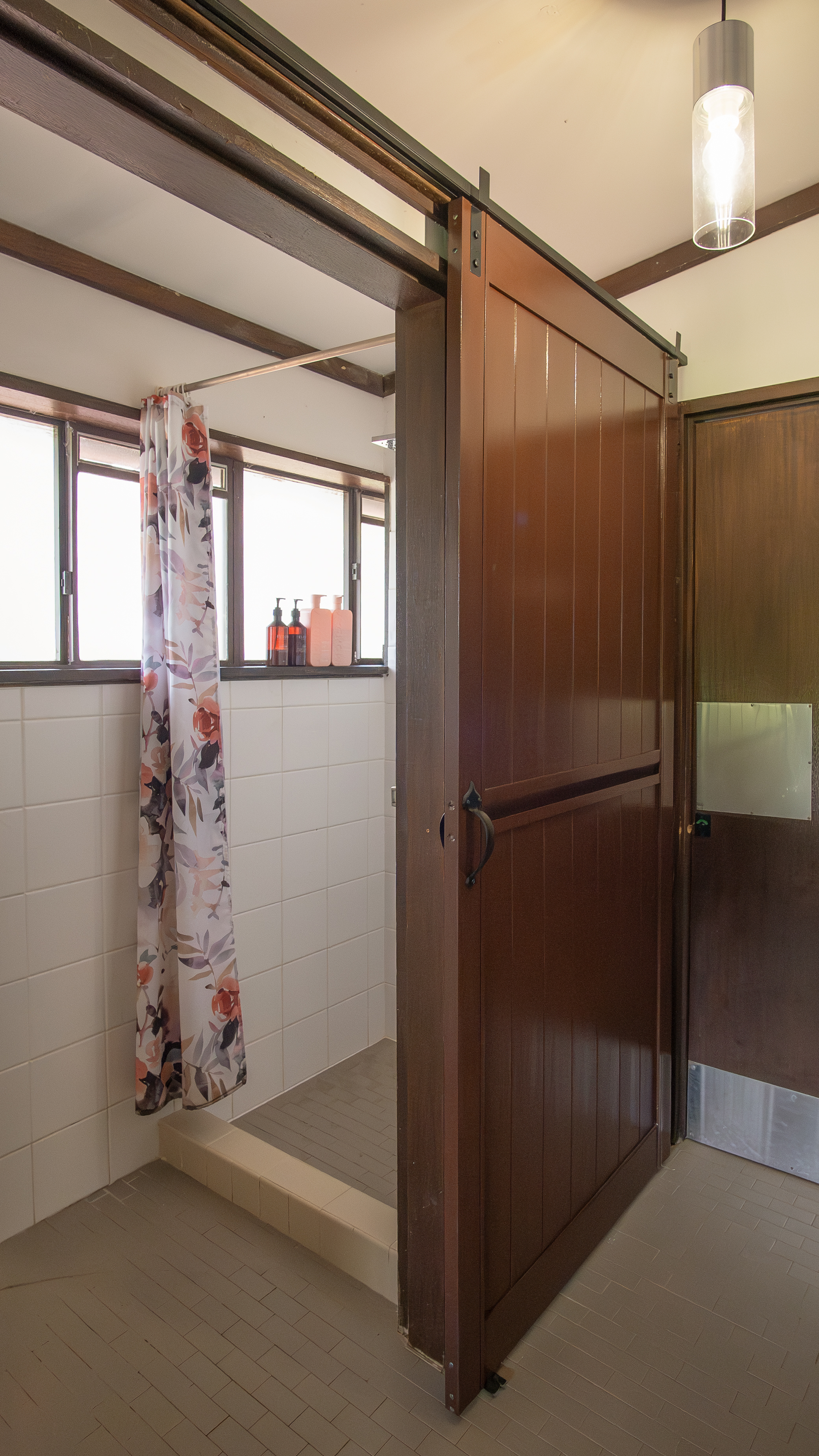 Rainfall shower head in the shared bathroom