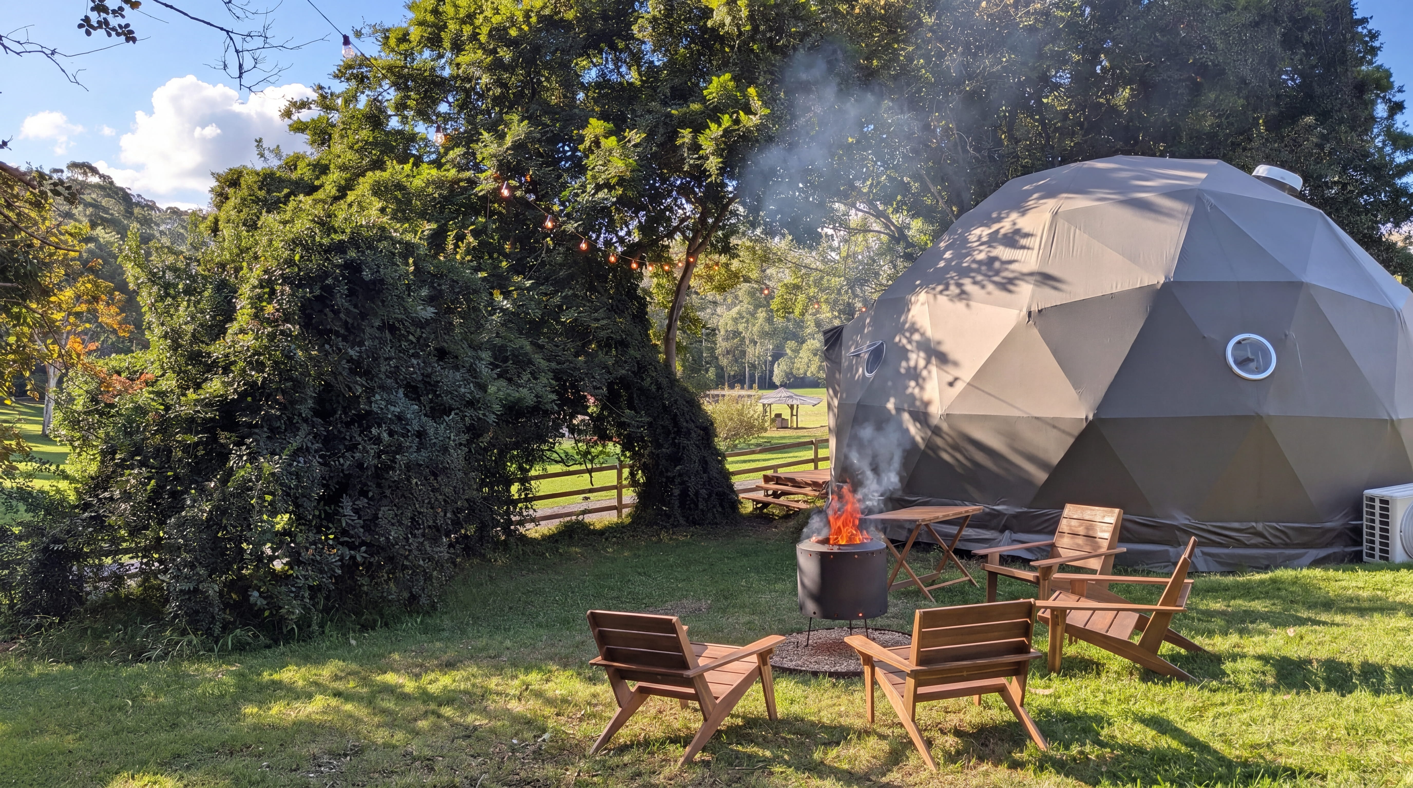 The Nest Glamping Dome with private fire pit and seating for four
